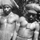  Men holding down pig for sacrifice - Hagen, Papua New Guinea, 1964 - (© P.J. Stewart & A.J. Strathern Archive)