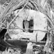 Skull-house with swordgrass thatch roof, mounted on post – at Pulupari and Epapini, near Iaro River, Pangia, PNG, 1967 - (© P.J. Stewart & A.J. Strathern Archive)