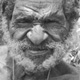 Senior man in his house-yard – Akel (person), Kawelka group, Hagen, Papua New Guinea, 1965 - (© P.J. Stewart & A.J. Strathern Archive)