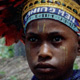 Image of a boy decorated with elaborate headdress – Nondukl, Wahgi, Papua New Guinea, February 1968– (© P.J. Stewart & A.J. Strathern Archive)